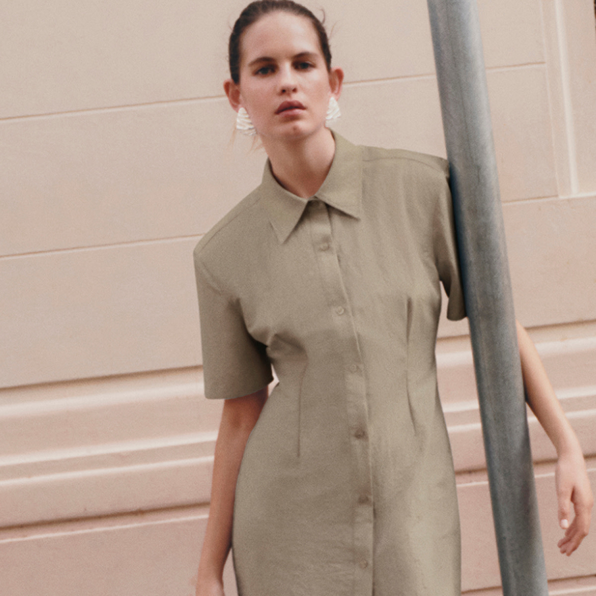 Woman wearing neutral dress