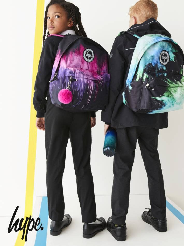 Girl and boy wearing Hype backpacks. Shop Hype