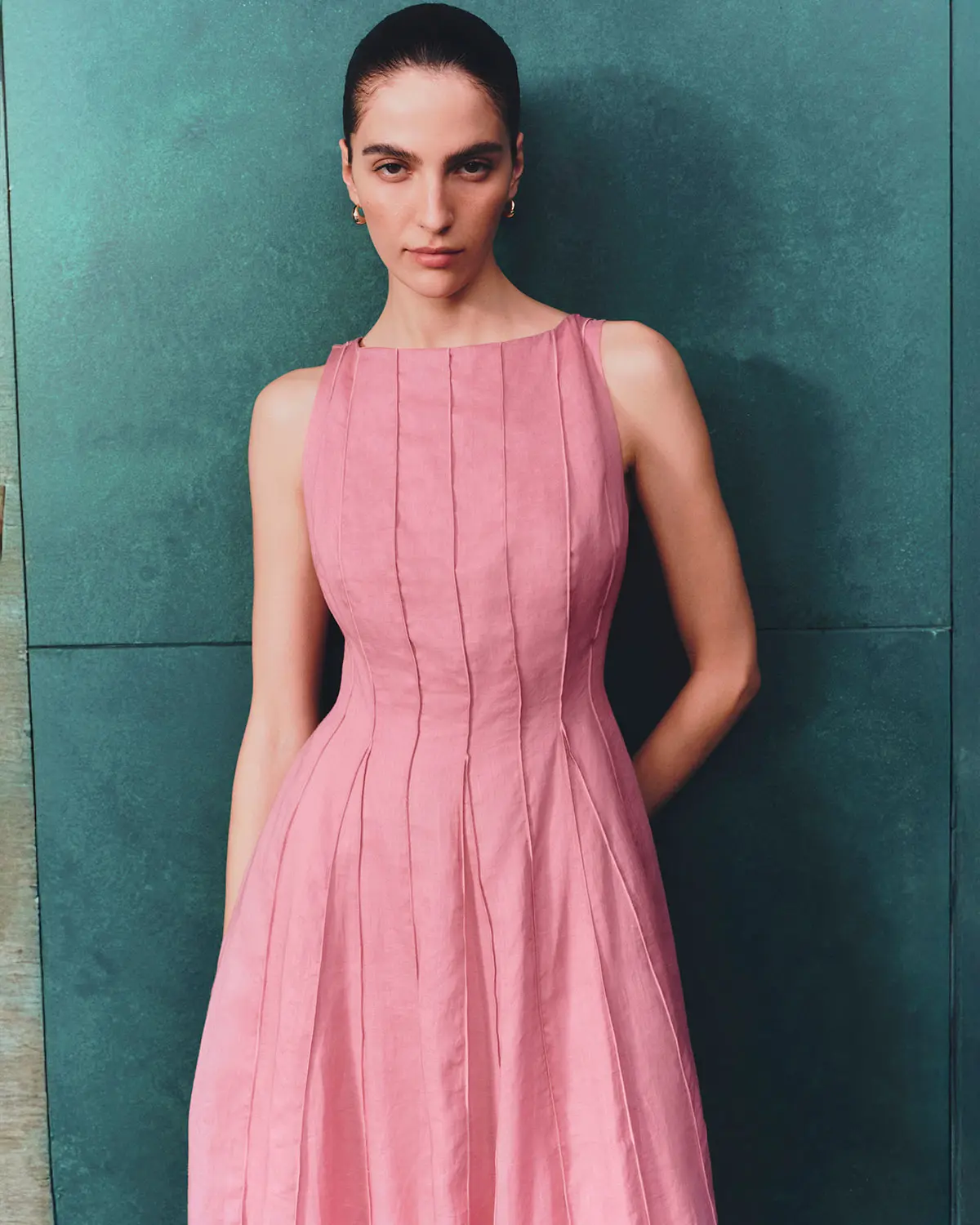 Woman wearing pink Autograph dress