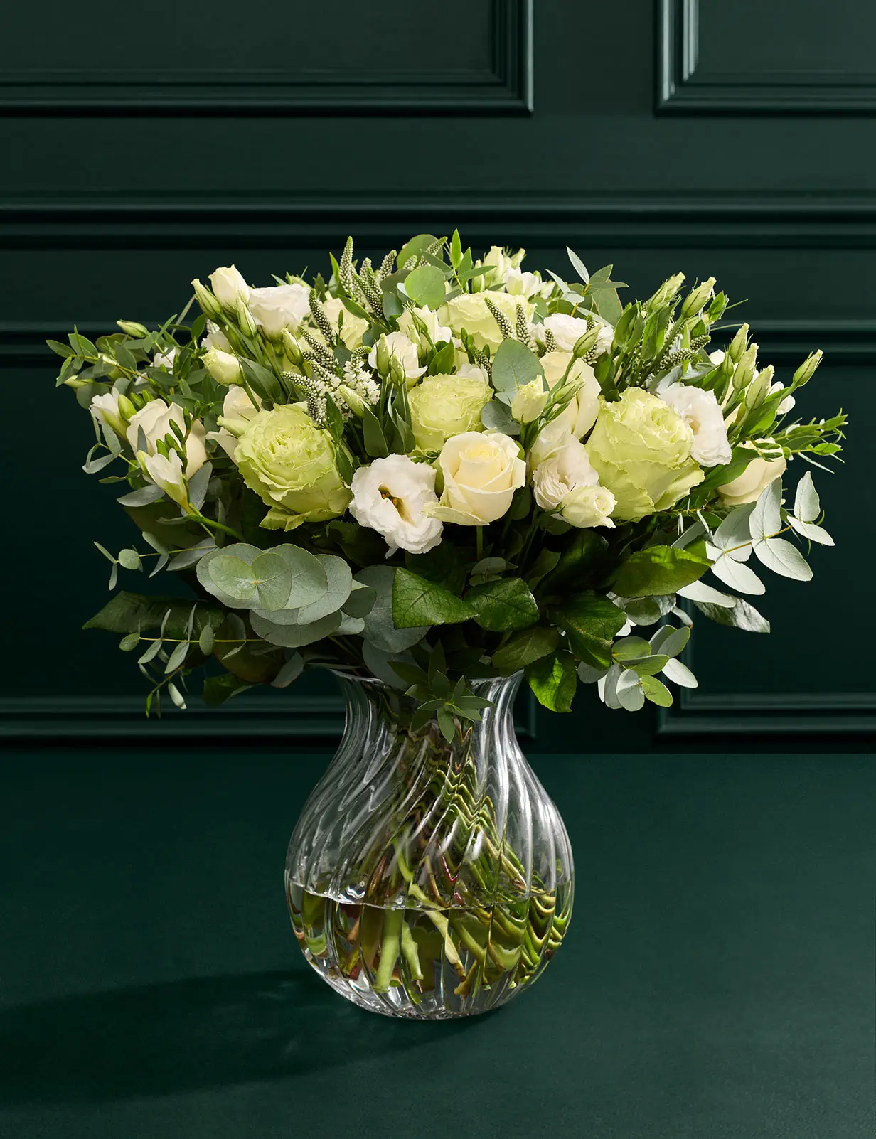 White floral Christmas bouquet with roses