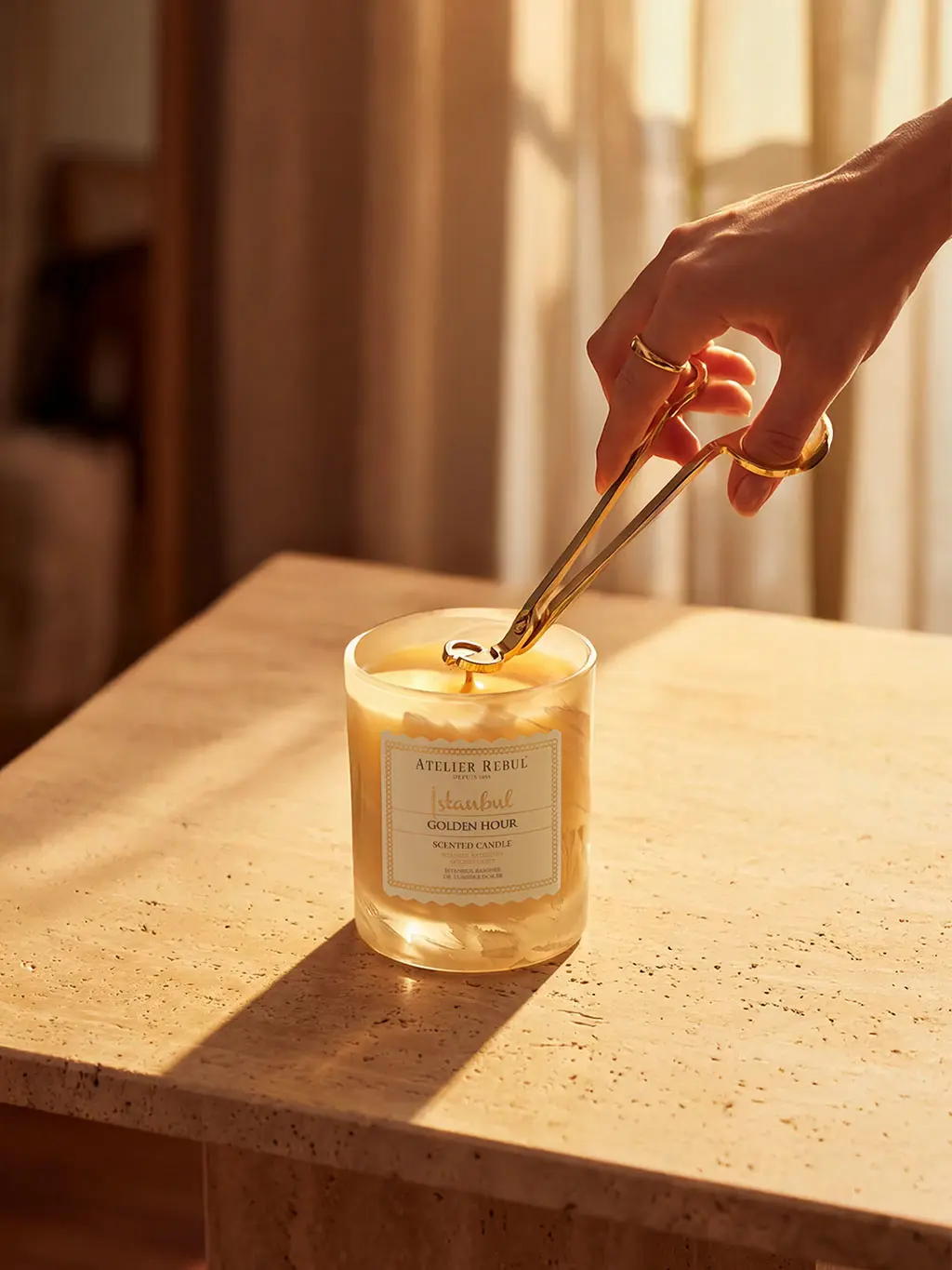 Person trimming wick of candle