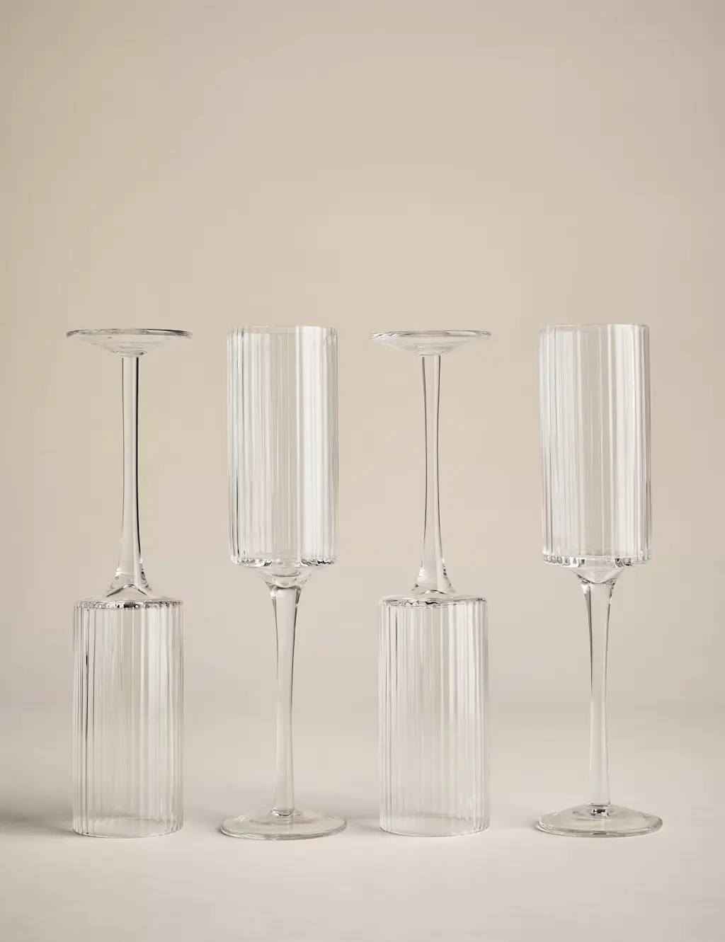 Four ribbed Champagne flutes