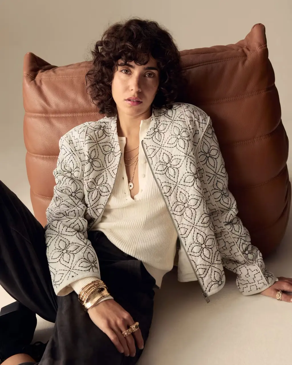 Woman wearing quilted jacket by Per Una at M&S