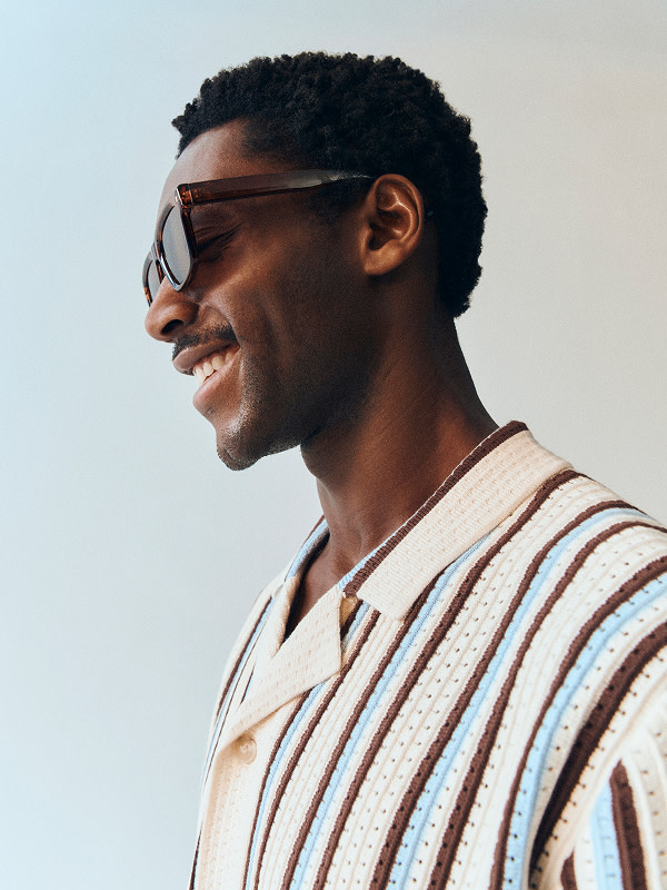 Man wearing striped t-shirt