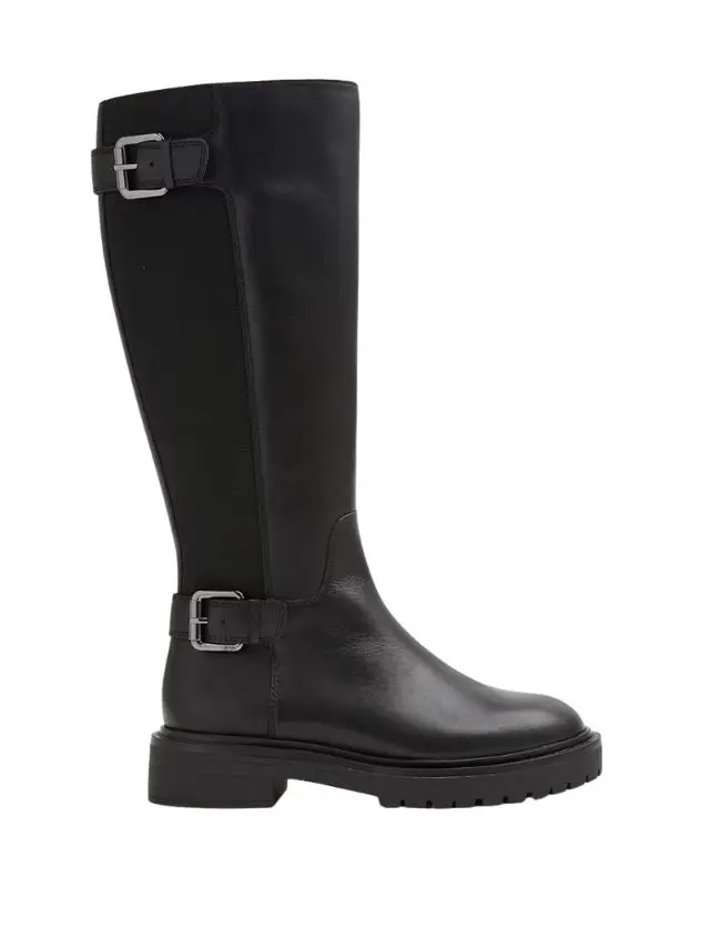 A cut out of black flat knee high boots with two buckles by M&S