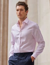 Man wearing pale pink shirt. Shop 4 for £149 Hawes & Curtis shirts