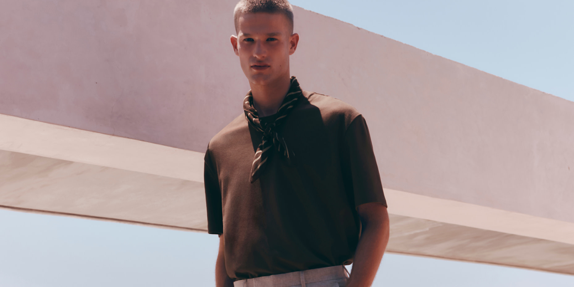 Man wearing brown t-shirt