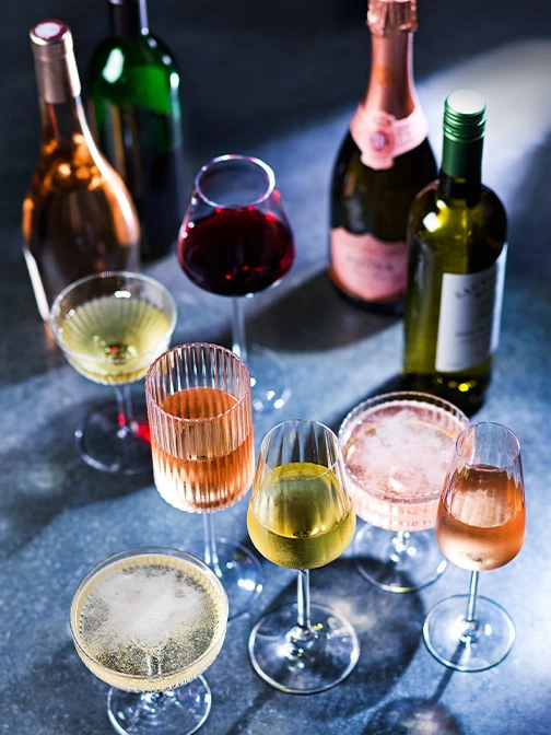 Selection of glasses of wine and bottles