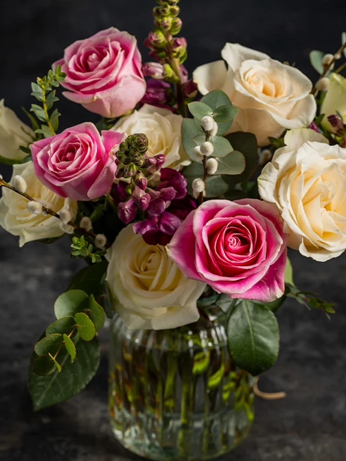 Pastel roses in vase