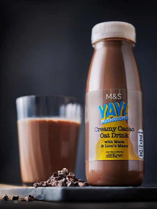 Bottle of chocolate oat milk drink.