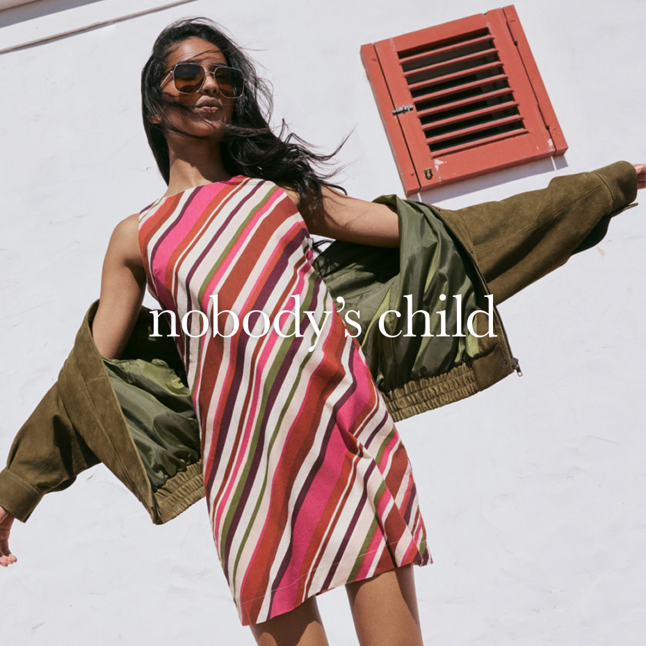 Woman in pink striped dress