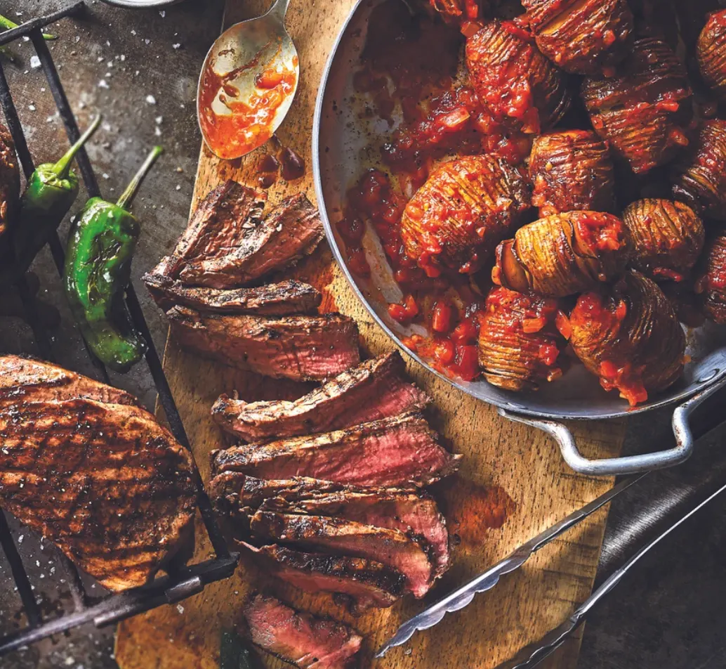 Spanish beef fillets with hasselback patatas bravas