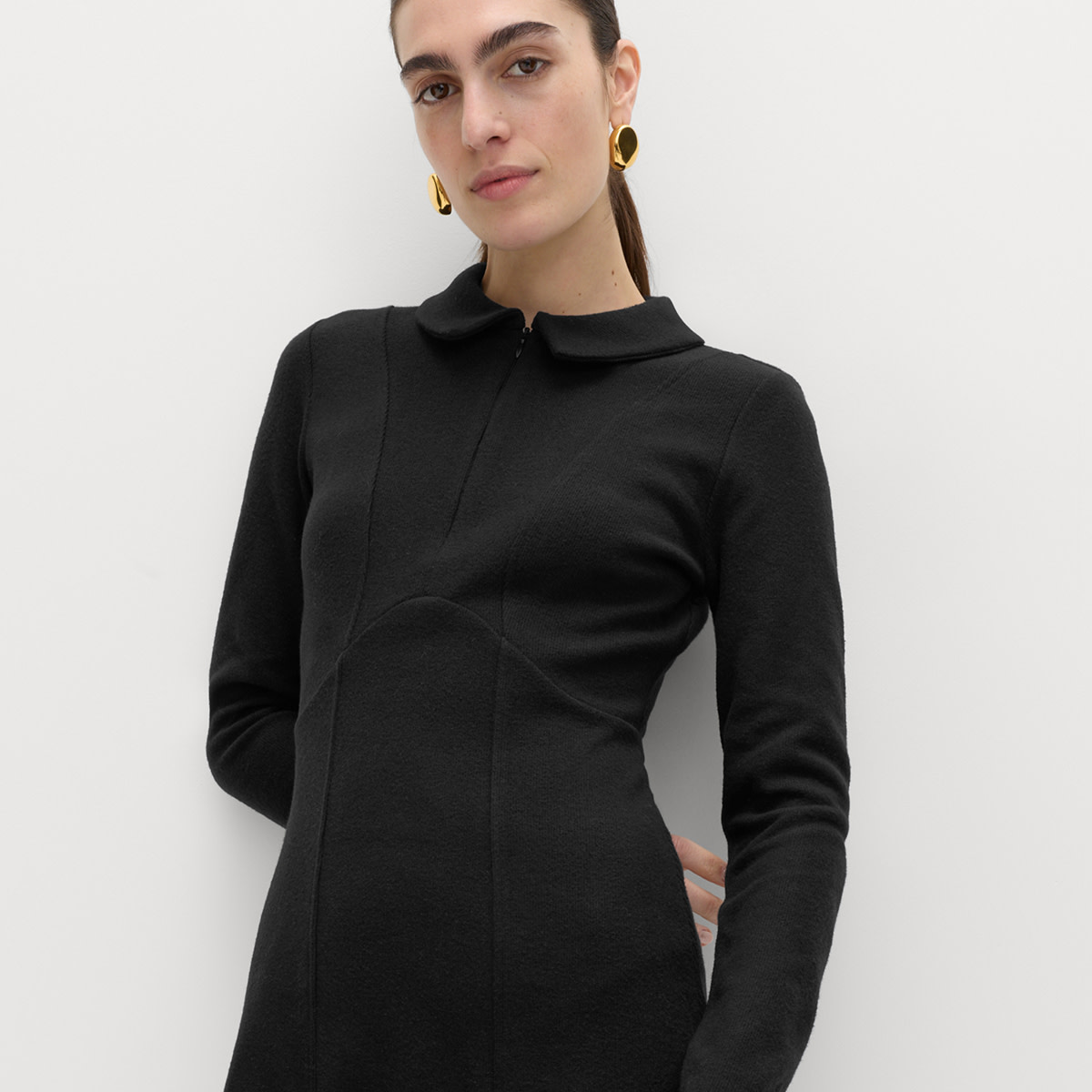 Woman wearing black dress