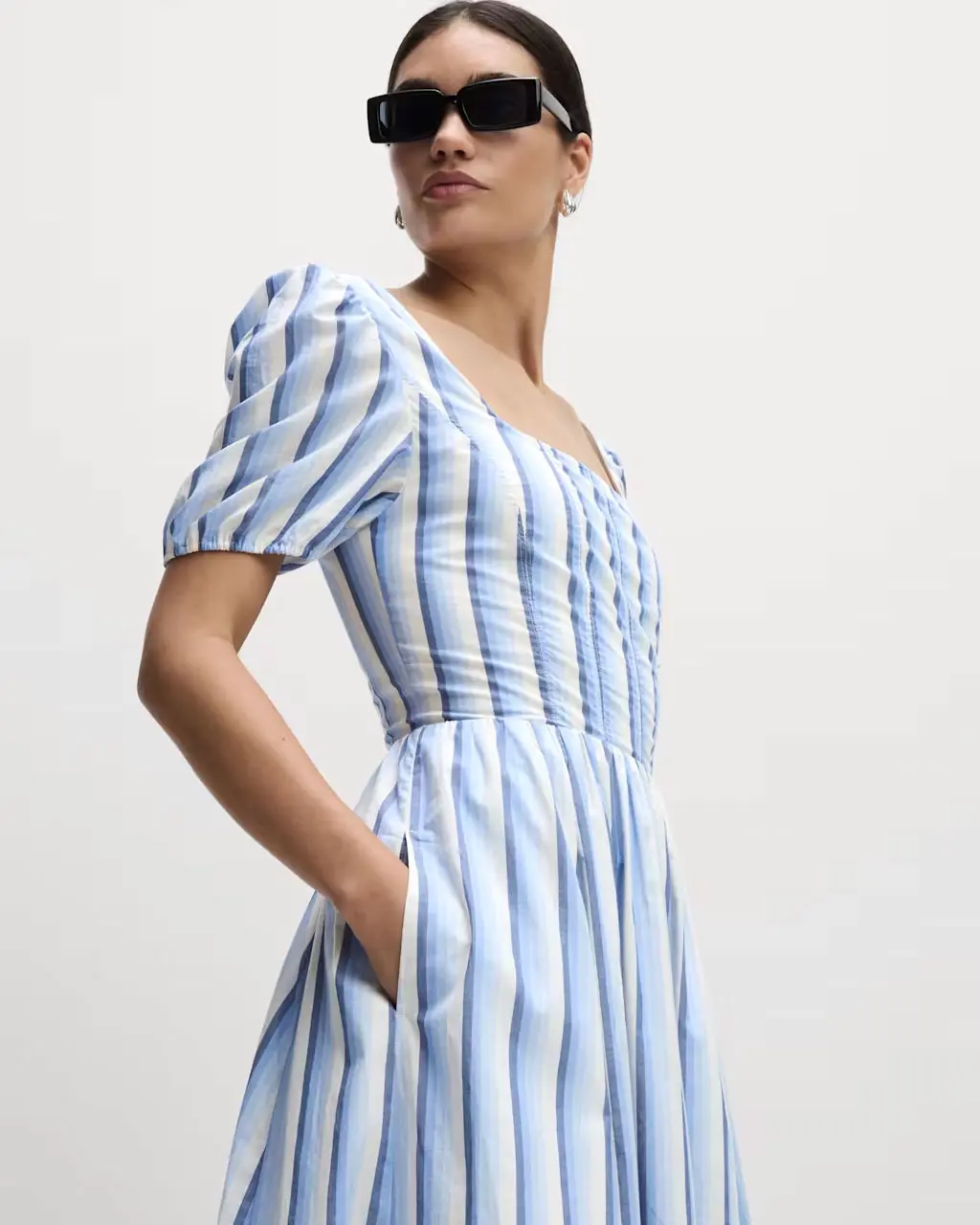 Woman wearing striped dress