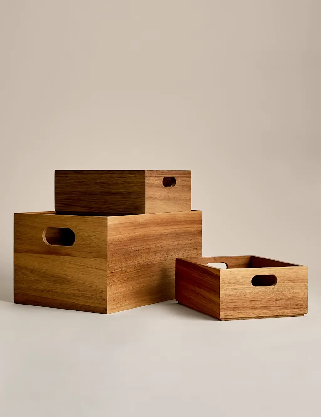 Three wooden stacking boxes