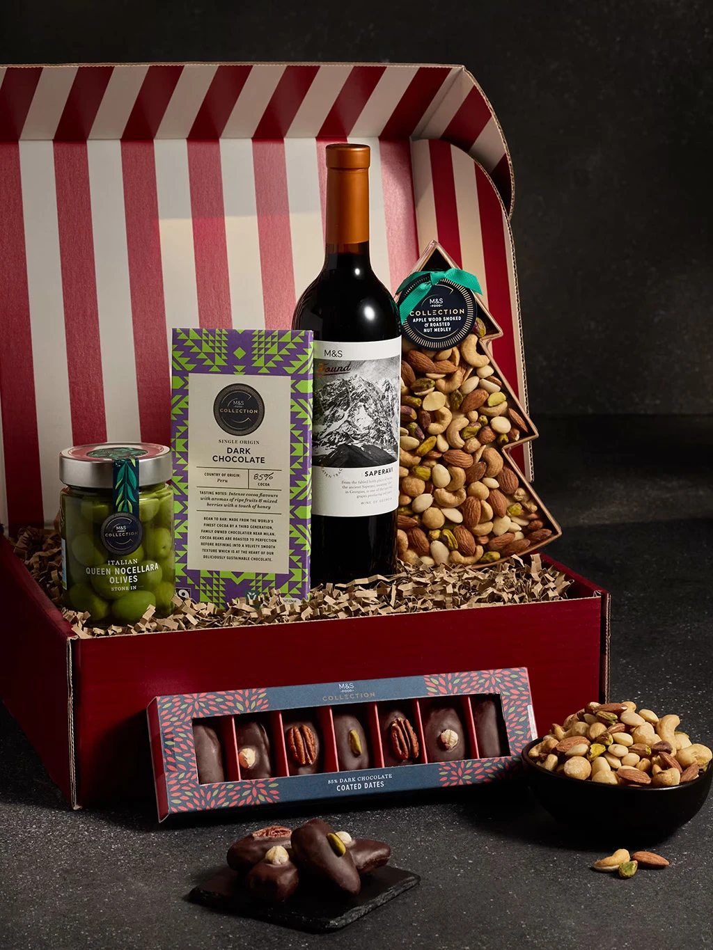 Christmas M&S hamper with a grazing selection and red wine.