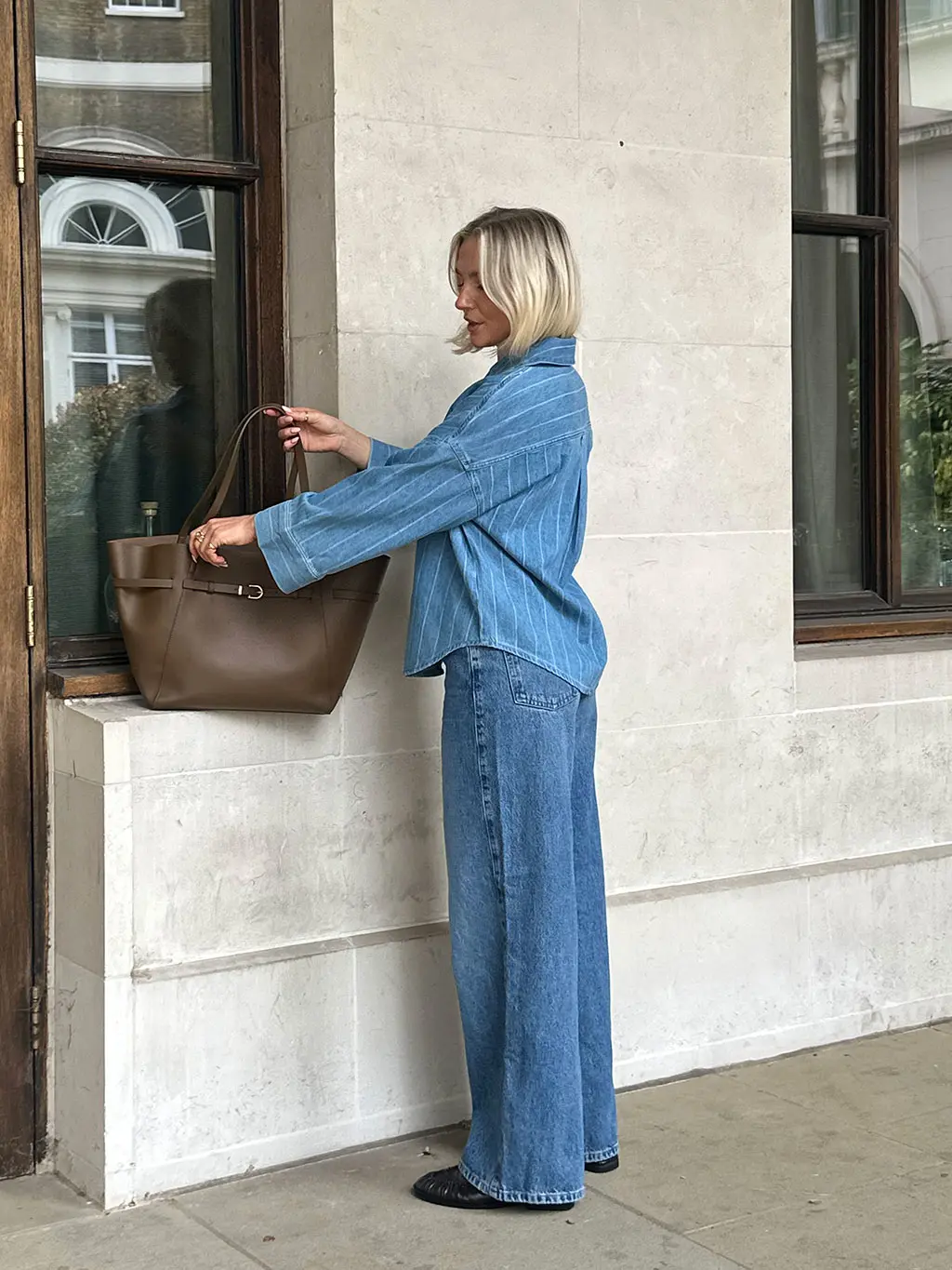 Woman in jeans and denim top