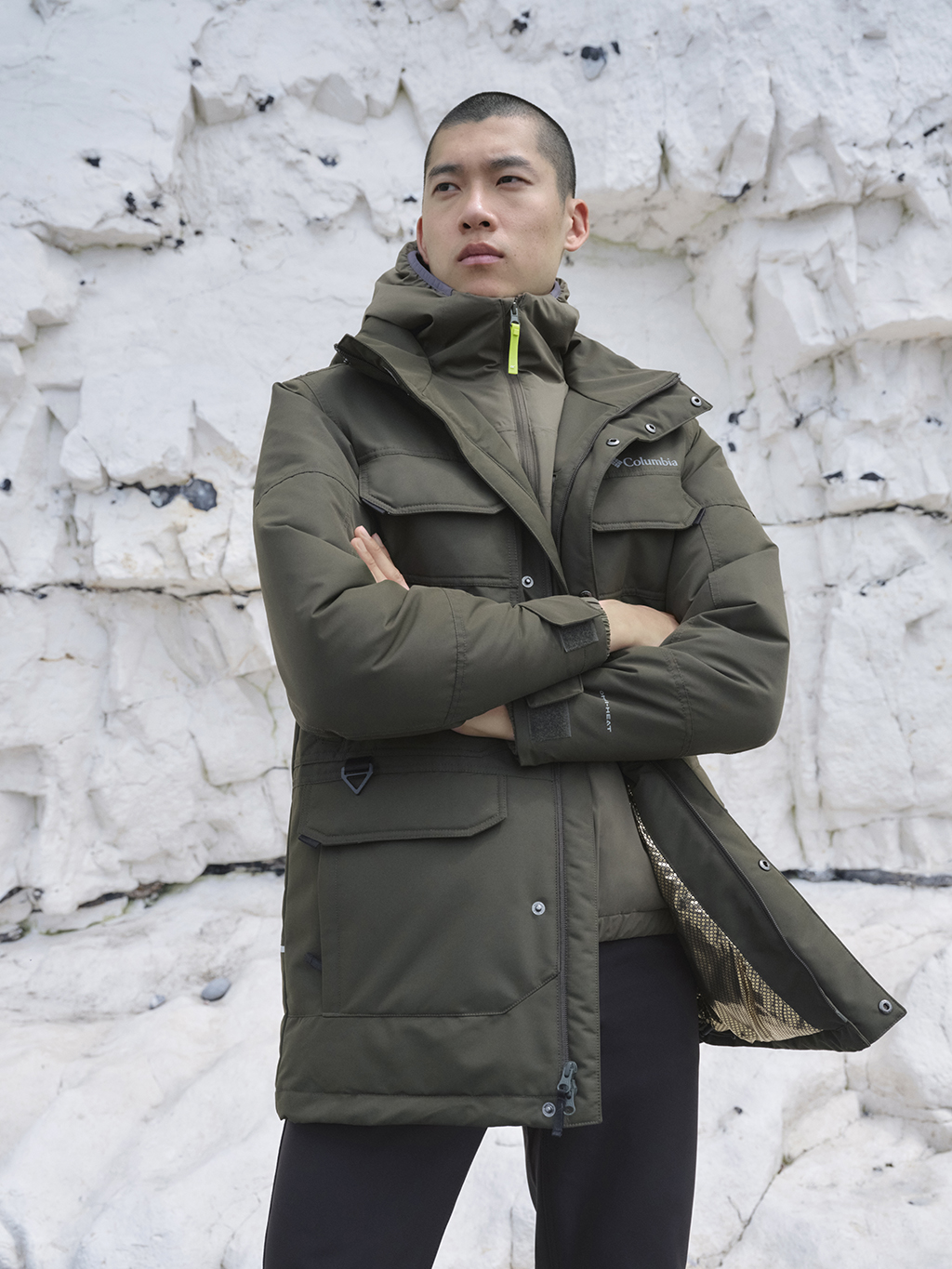 Man wearing khaki Columbia parka coat