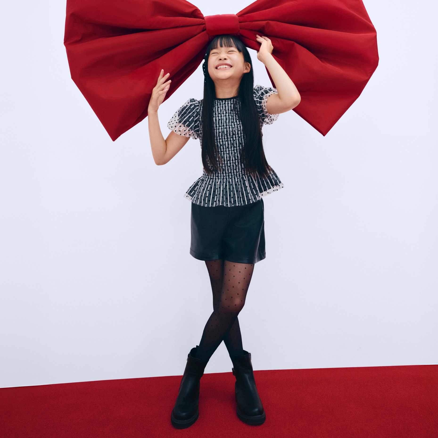 Girl wearing partywear at M&S