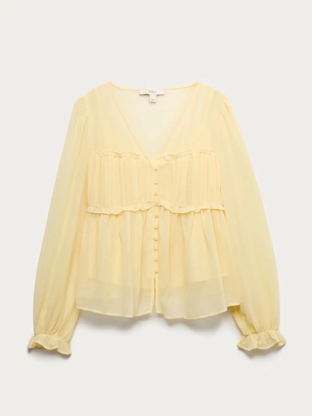 Voluminous yellow blouse
