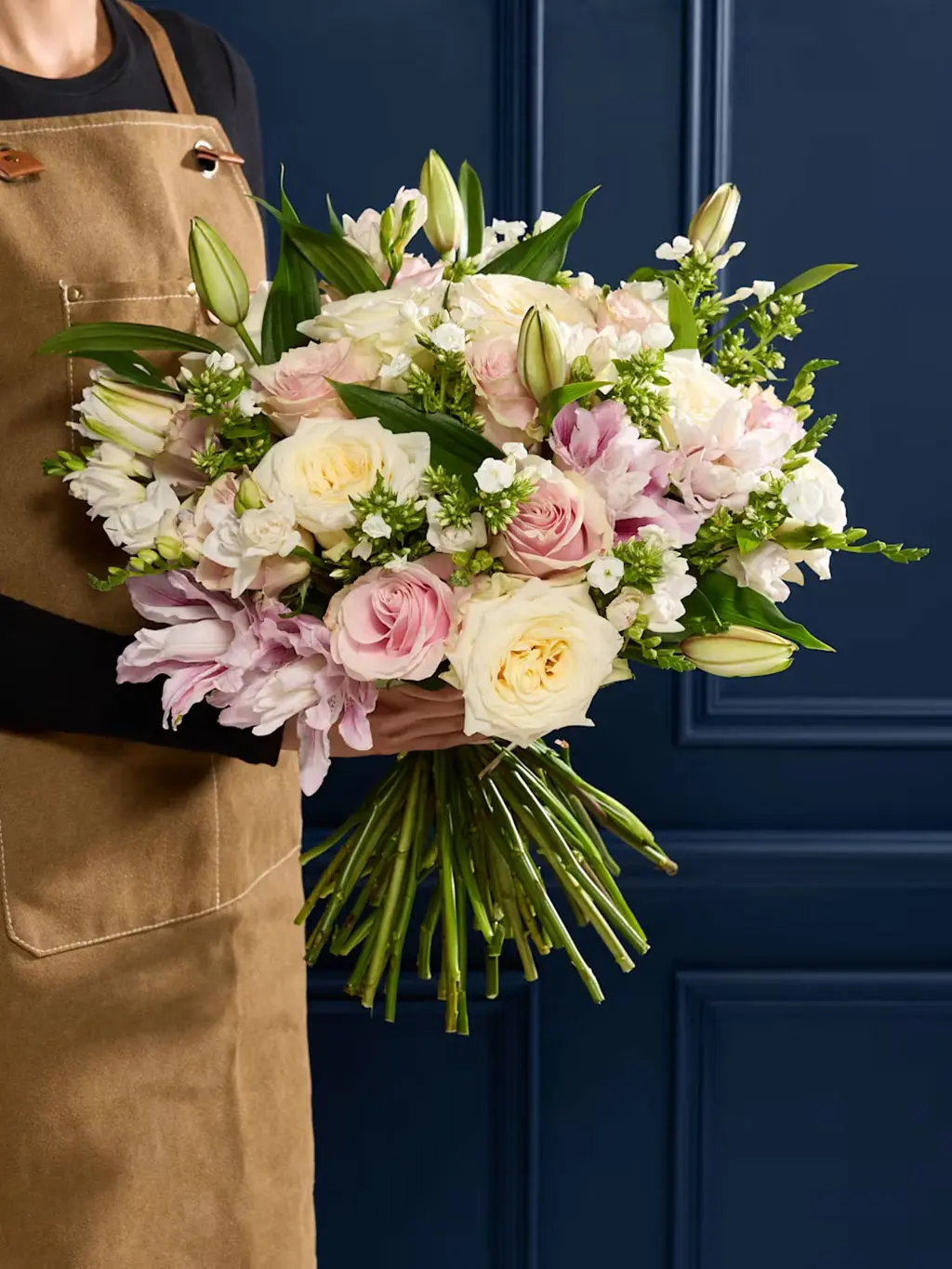 Woman holding our Katherine Jenkins bouquet