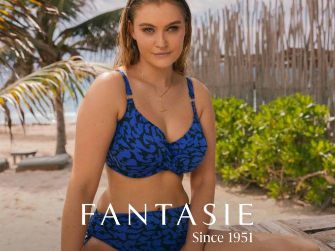 Woman wearing blue printed bikini set. Shop Fantasie