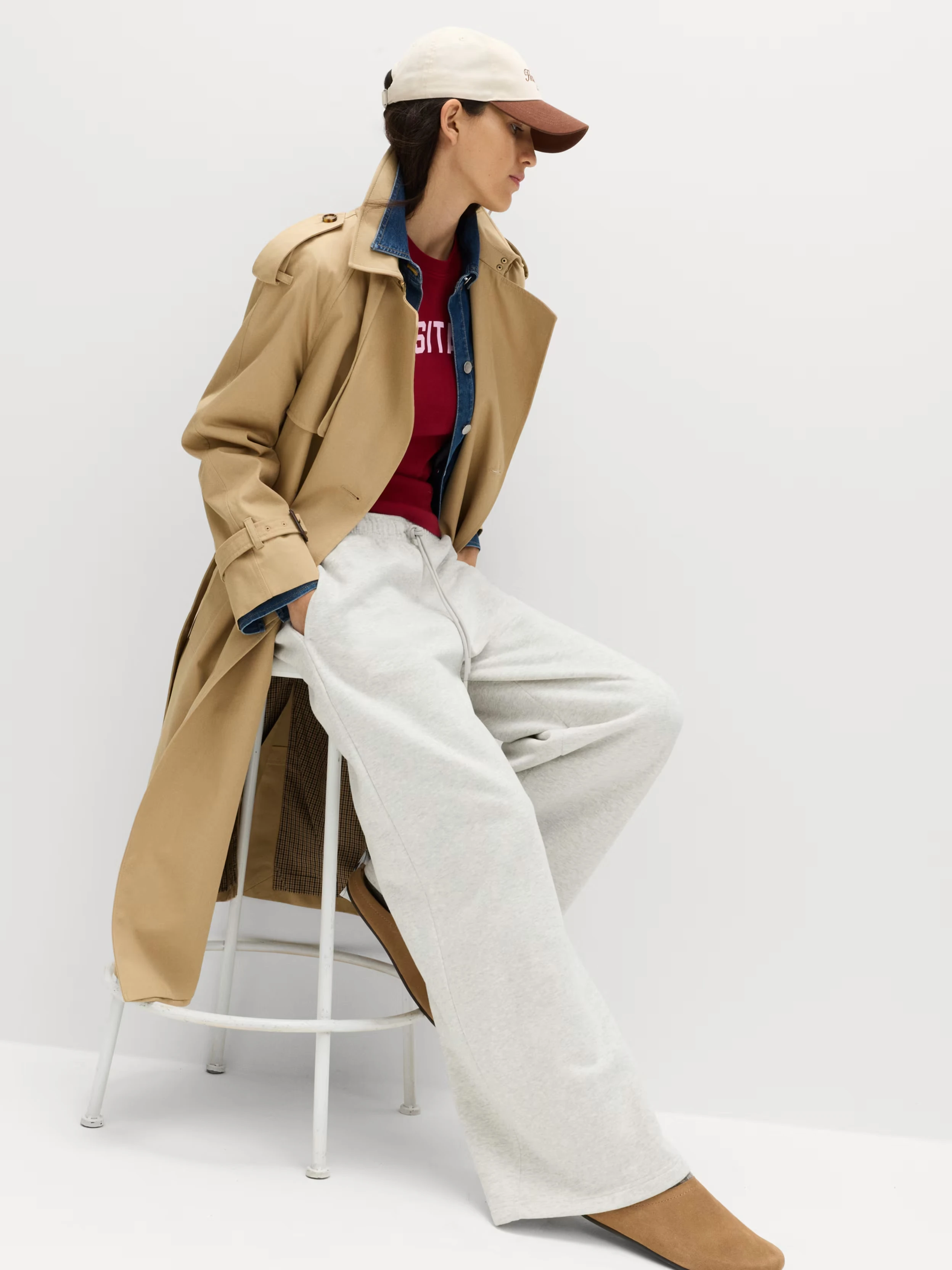 Woman in joggers and coat