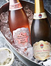 Image of prosecco bottles in a tub of ice. Shop up to 30% off selected wines