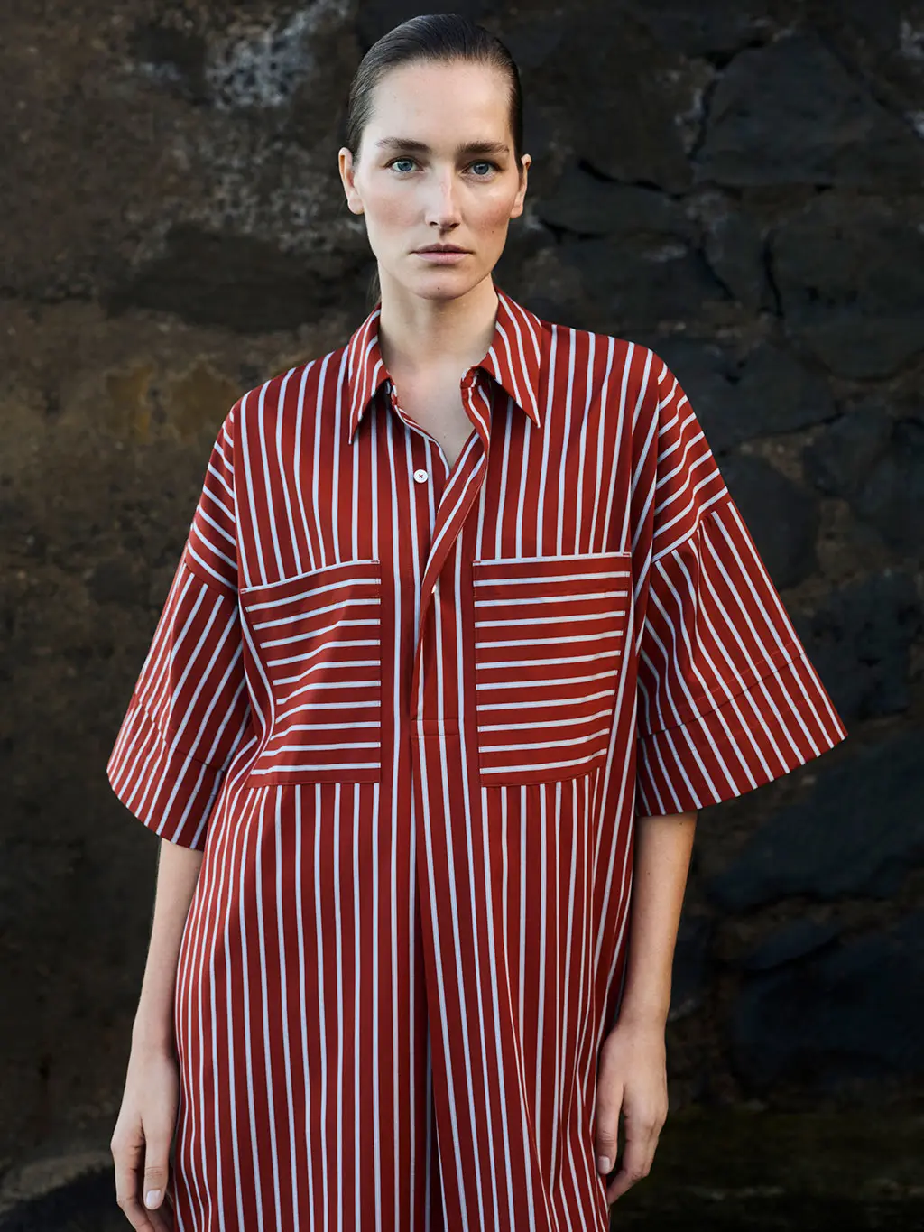 Woman in striped shirt dress