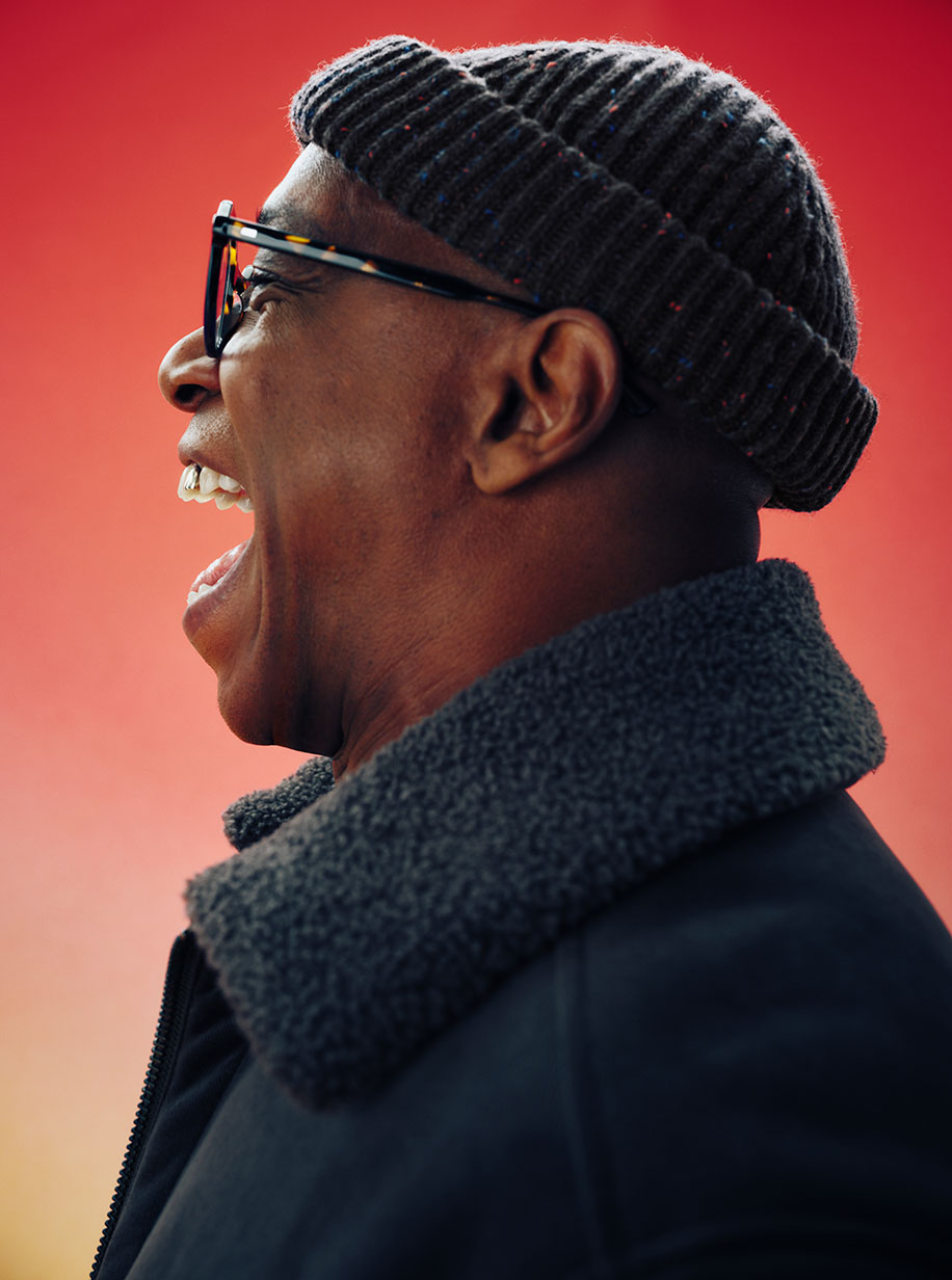 Ian Wright wearing a flat cap from the M&S x Ian Wright hat collection.