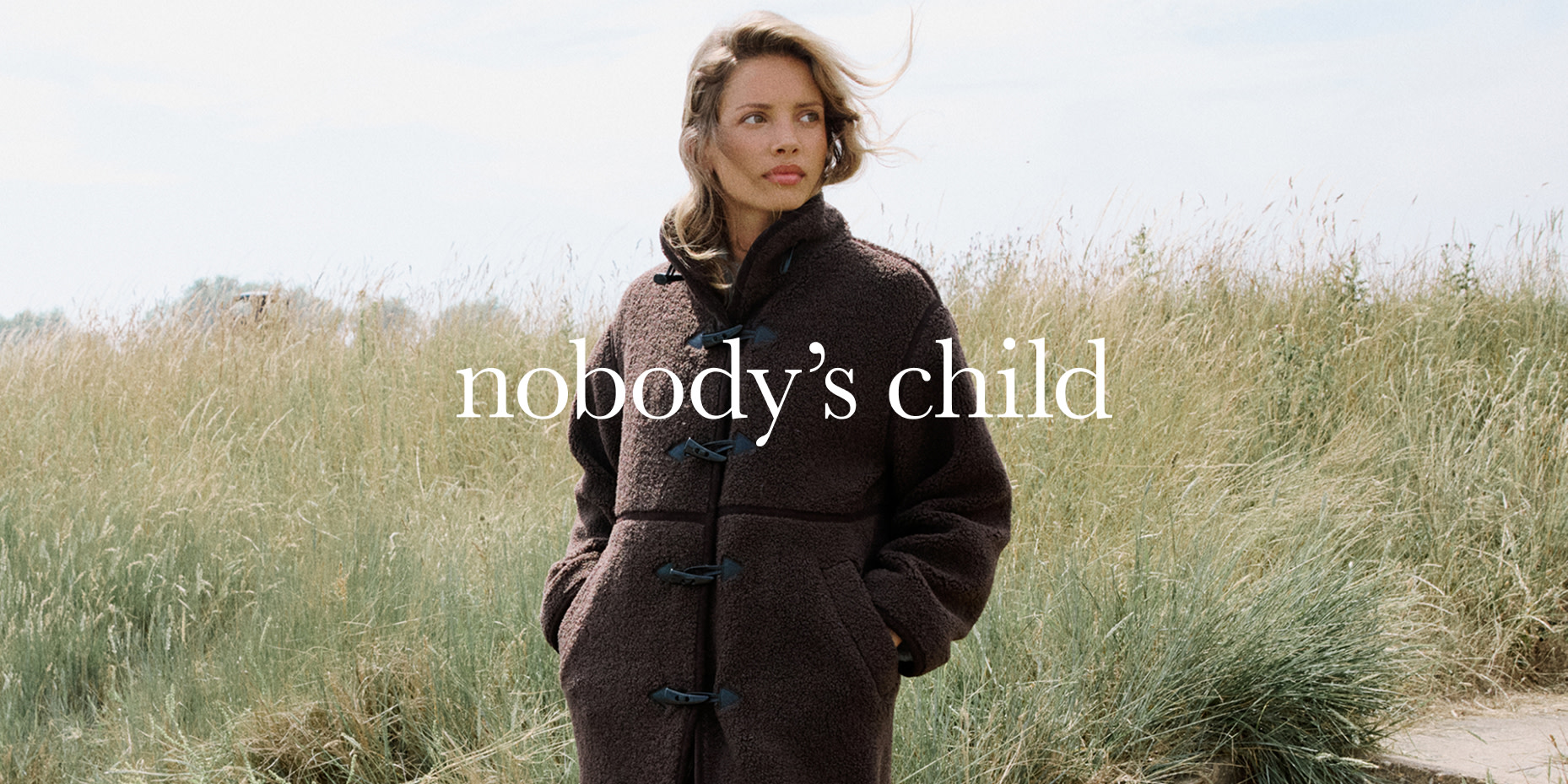 Woman wearing brown Nobody's Child jacket
