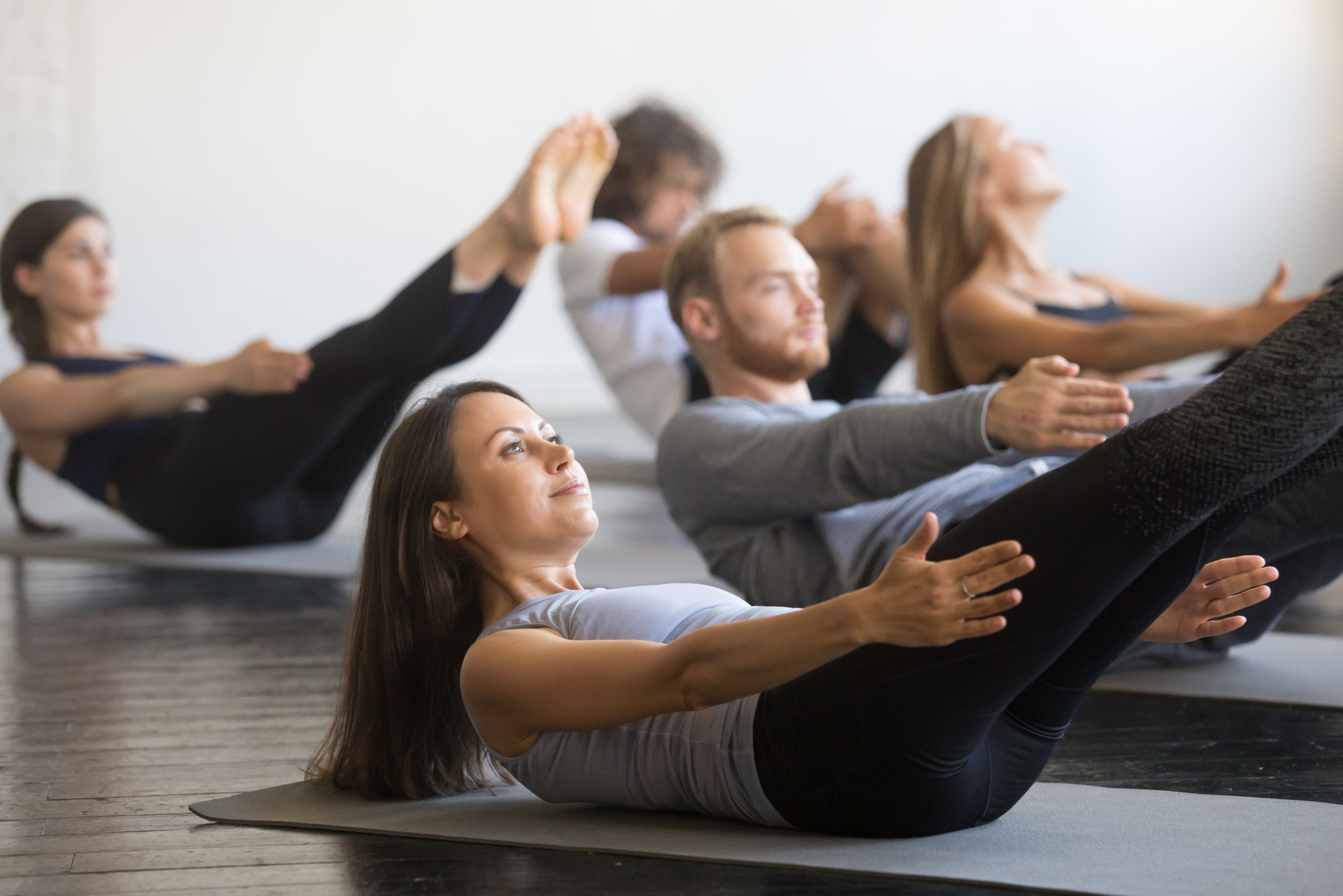 Male and Females in a Mat Pilates Class