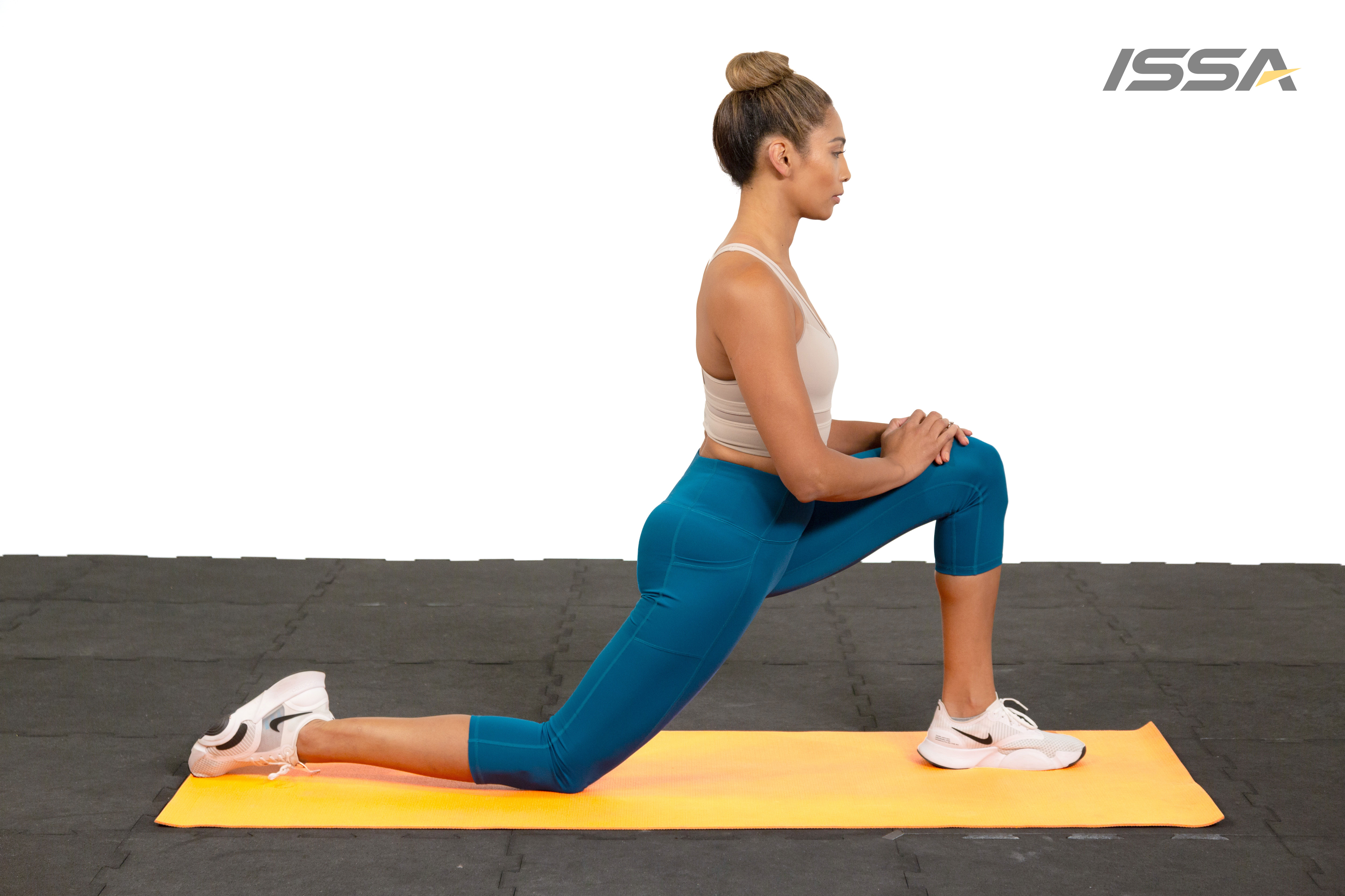 ISSA, International Sports Sciences Association, Certified Personal Trainer, ISSAonline, How to Stretch and Strengthen the Psoas, Lunge Stretch