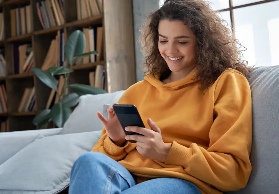 Woman looking at her mobile phone