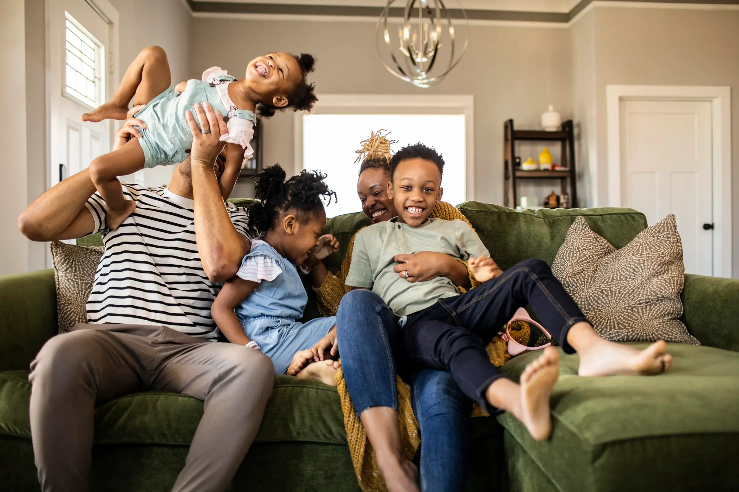 Moving Mindsets - Family on sofa