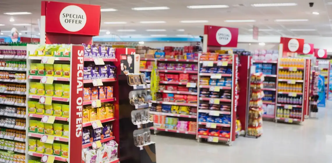 Customer using personalised retail promotions while shopping
