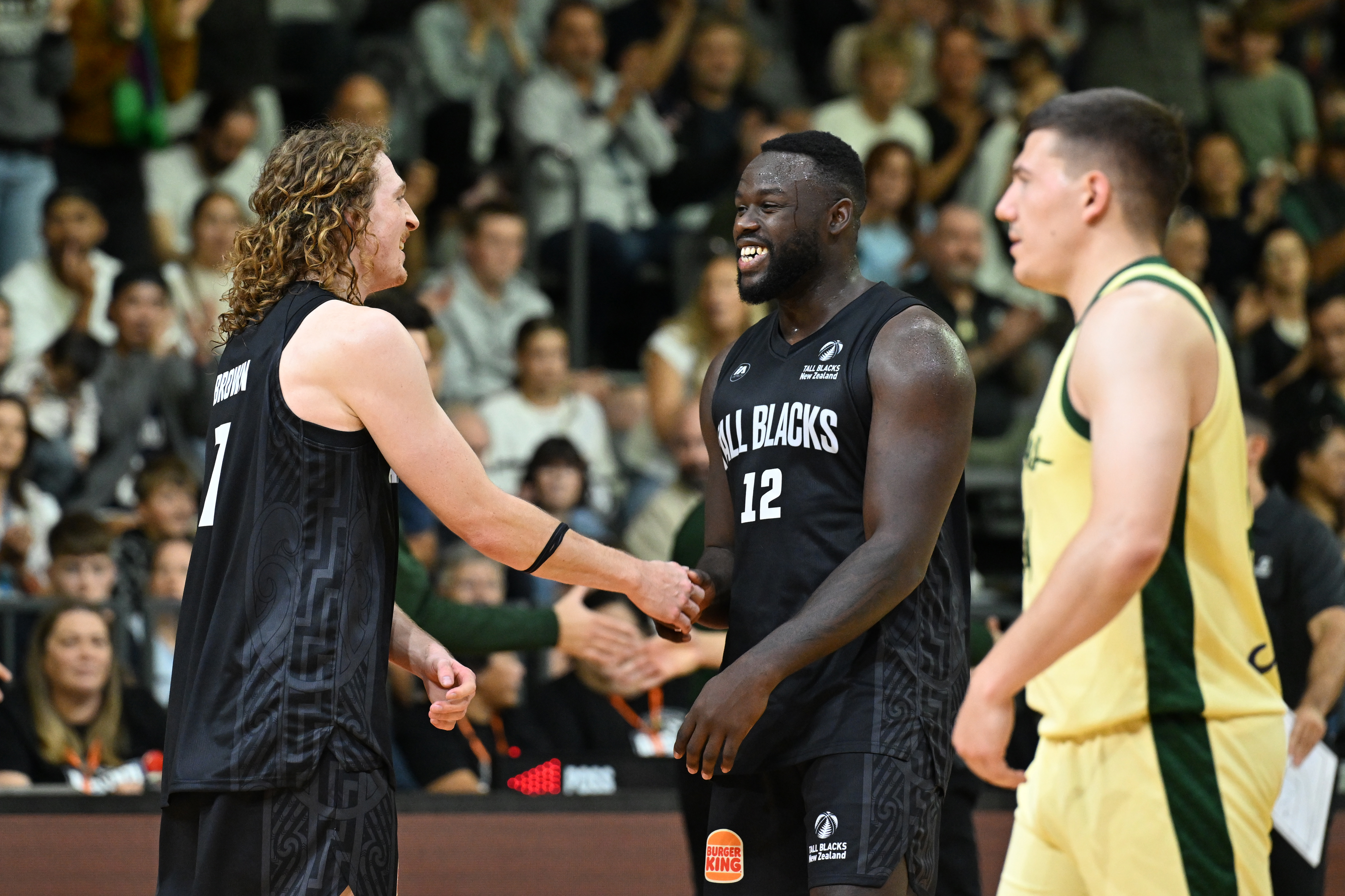 The Tall Blacks celebrate victory