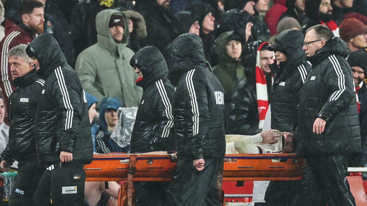 Liverpool's Conor Bradley is stretchered from the pitch after suffering an injury against Arsenal