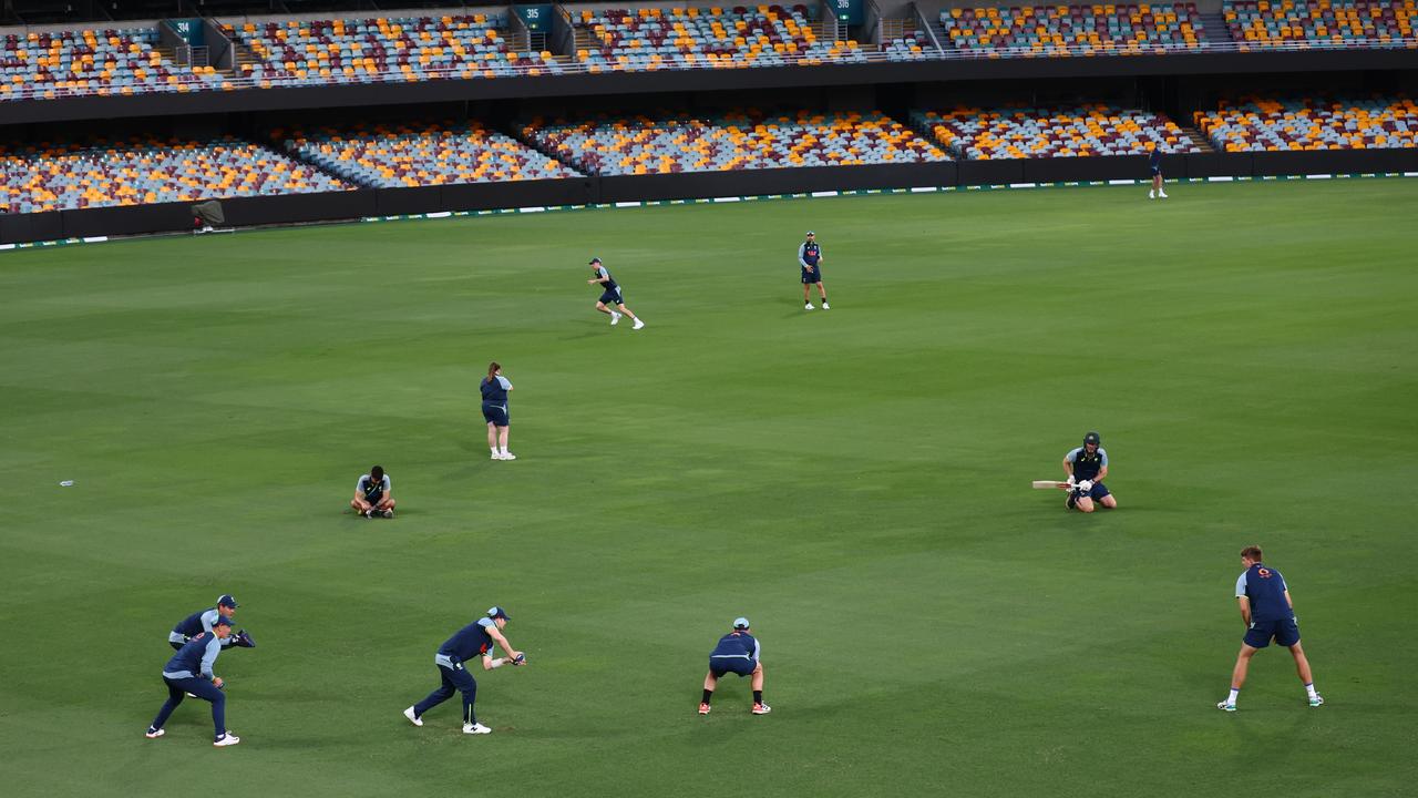 Australian players sweat it out during a training session at the Gabba ahead of the second Test
