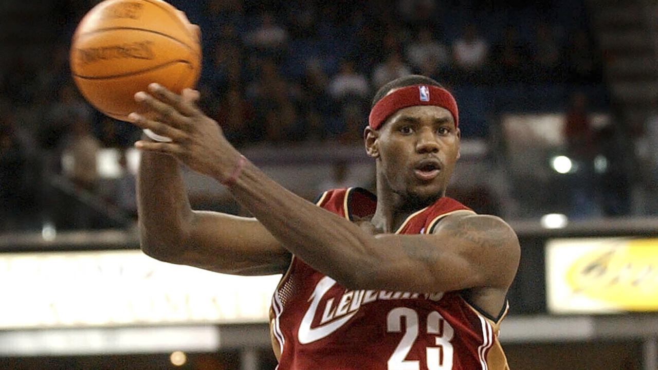 LeBron in action for Cleveland in 2003 in his rookie season.