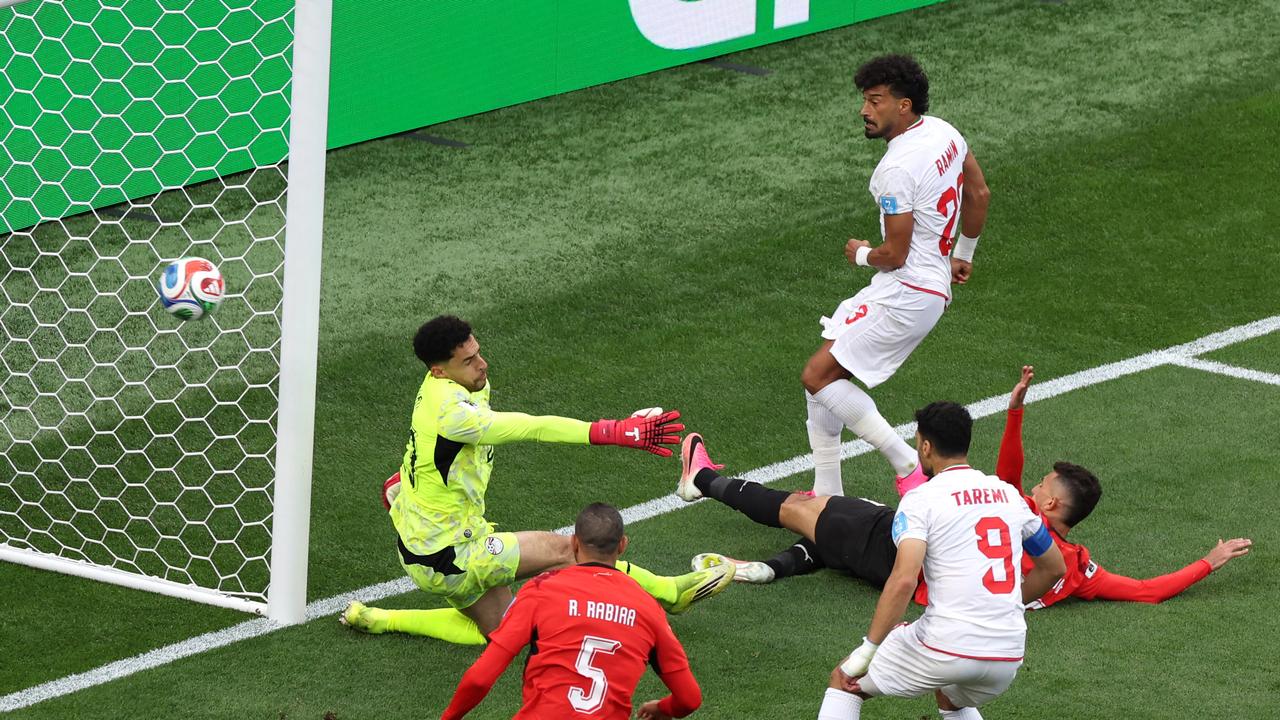 Egypt goalkeeper Mostafa Shoubir was unable to stop Ramin Rezaeian scoring Iran's equaliser