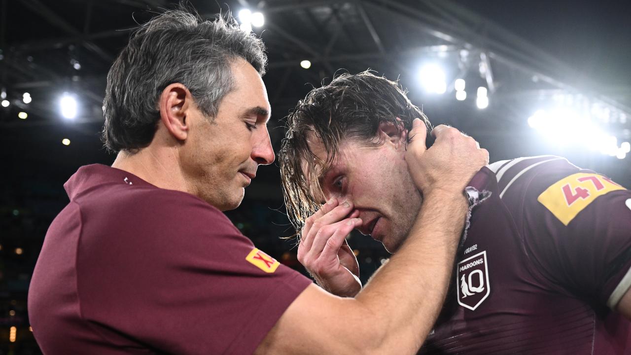 Billy Slater embraces captain Cameron Munster