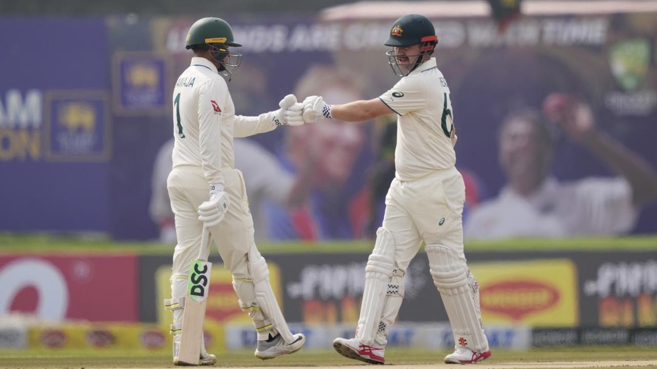 Usman Khawaja and Travis Head
