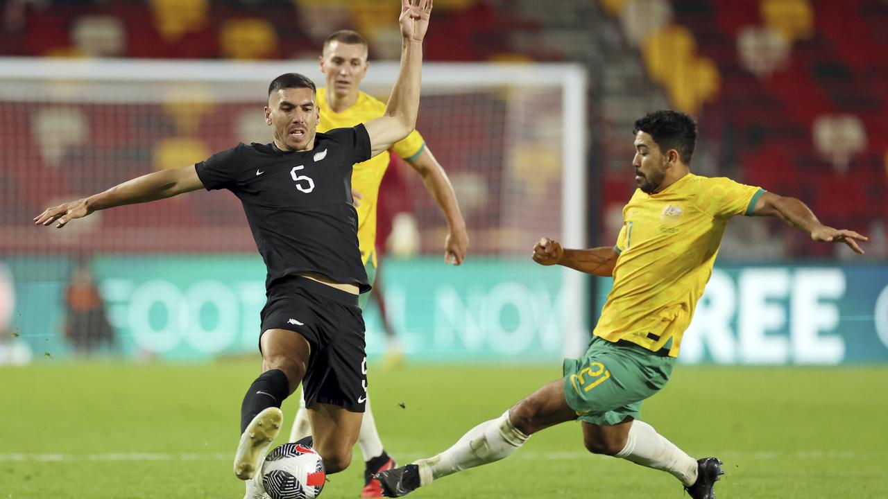 Massimo Luongo battles Michael Boxall 