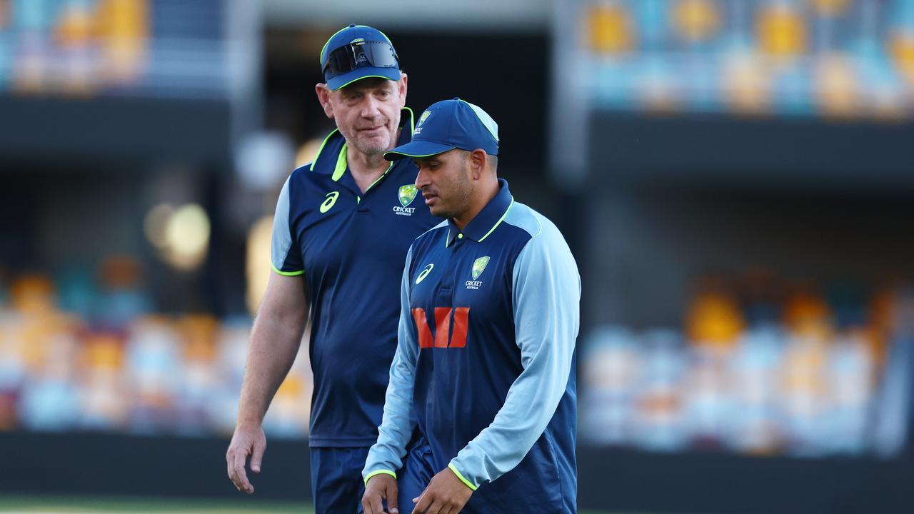 Usman Khawaja with Australia coach Andrew McDonald