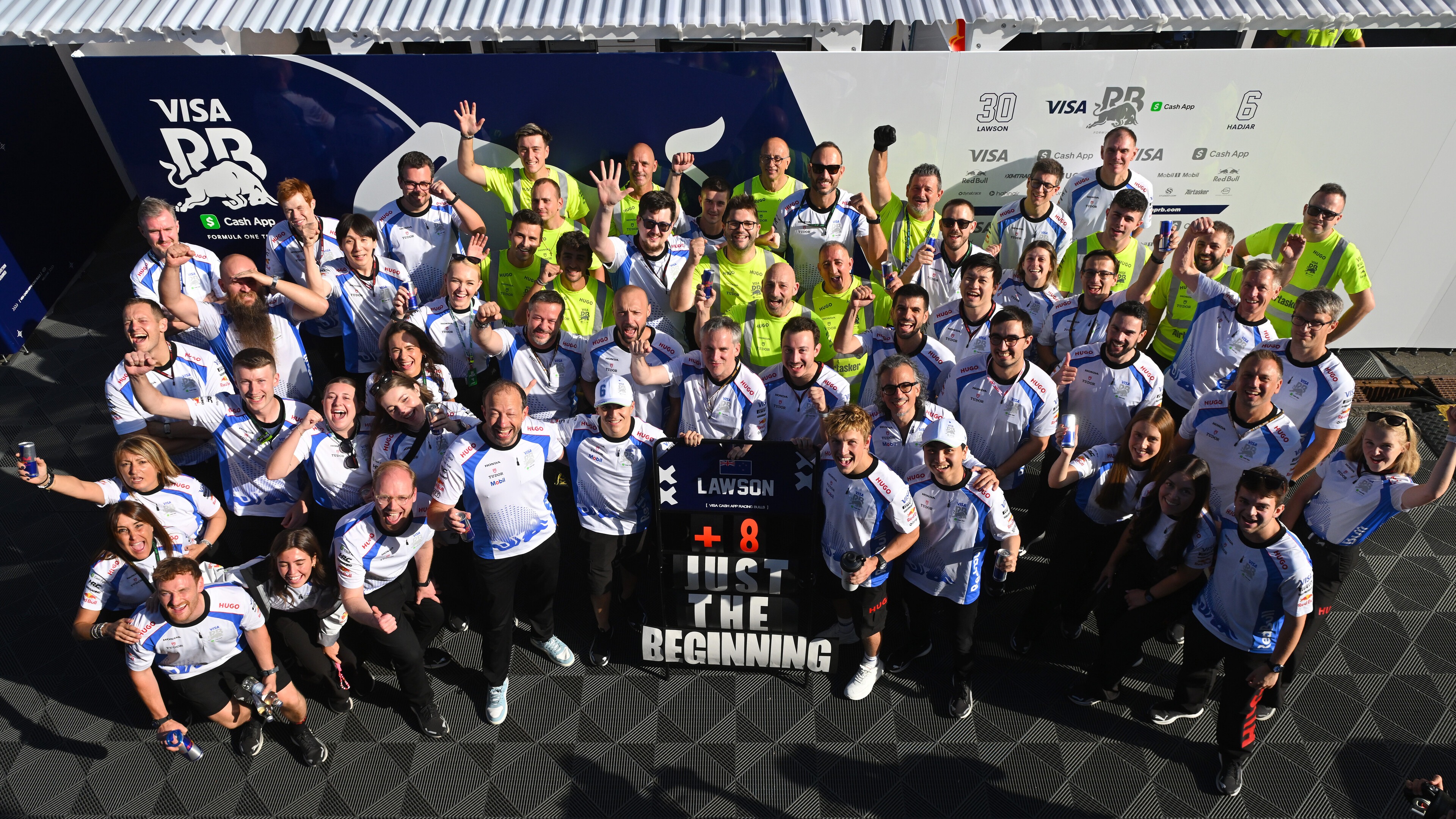 Liam Lawson with his Racing Bulls team after Austrian Grand Prix