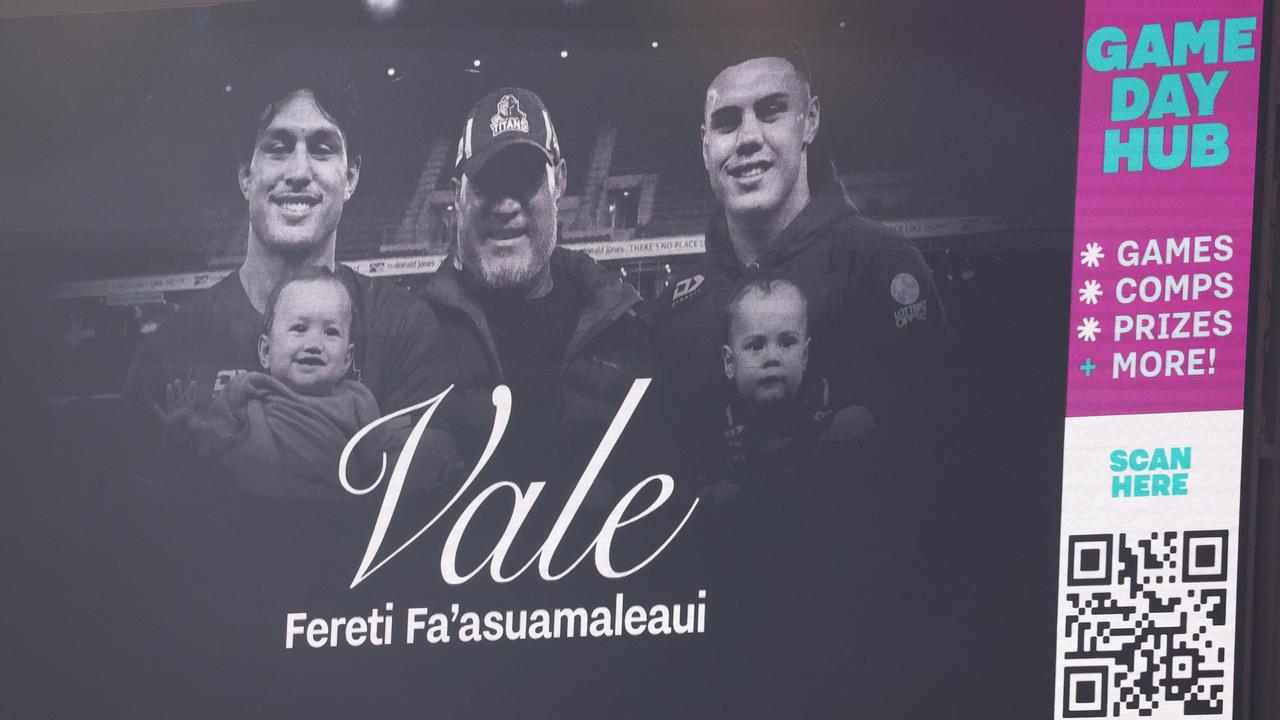 A tribute to Fereti Fa'asuamaleaui is played on the Cbus Super Stadium big screen
