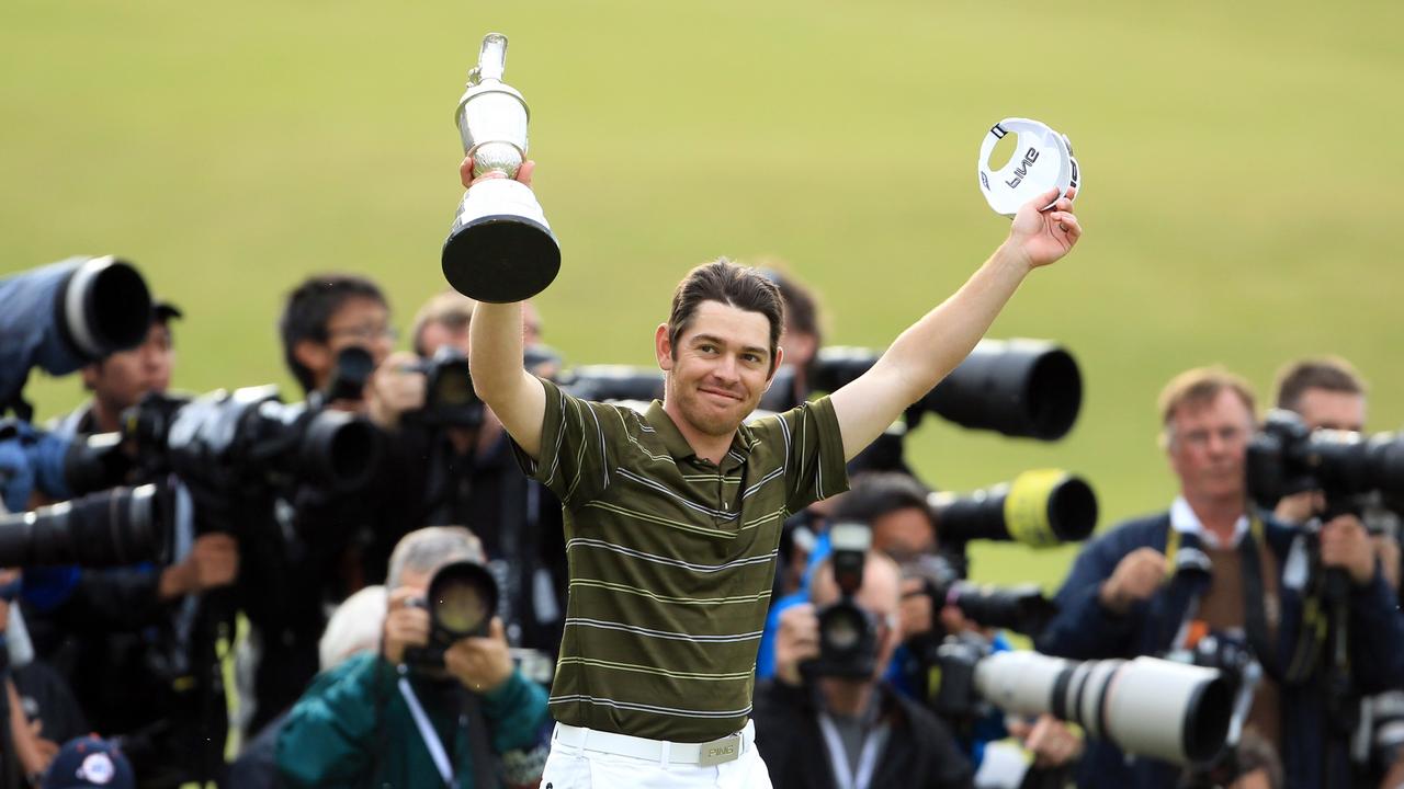 Louis Oosthuizen holds the trophy aloft after winning the 2010 British Open at St Andrews