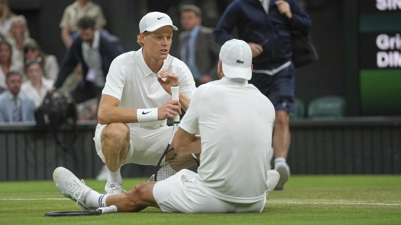 Jannik Sinner checks on Grigor Dimitrov.jpeg