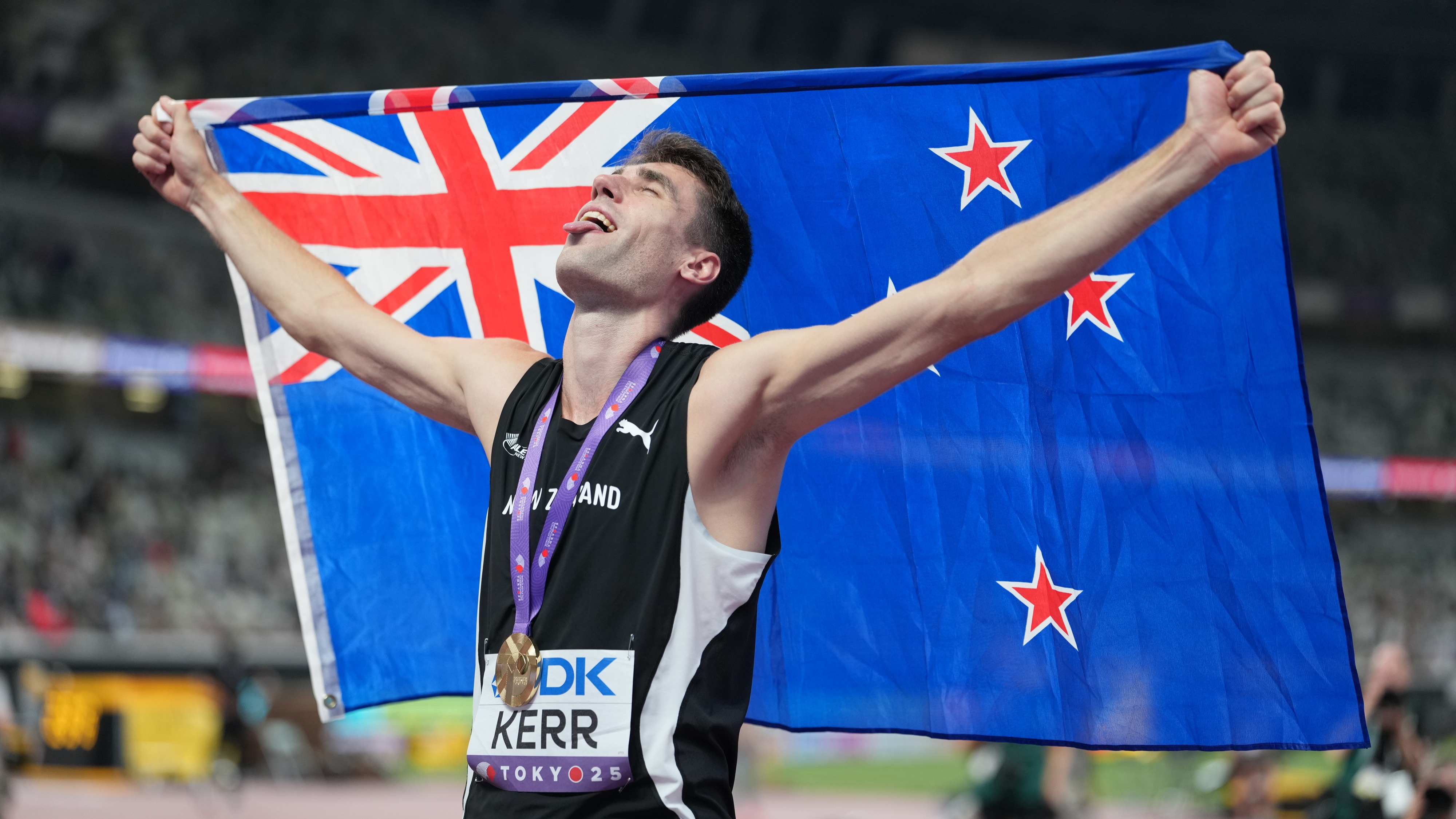 Hamish Kerr celebrates winning the Men's High Jump final at the 2025 World Athletics Championships in Tokyo